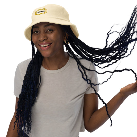 Terry cloth bucket hat with "good vibe" logo design